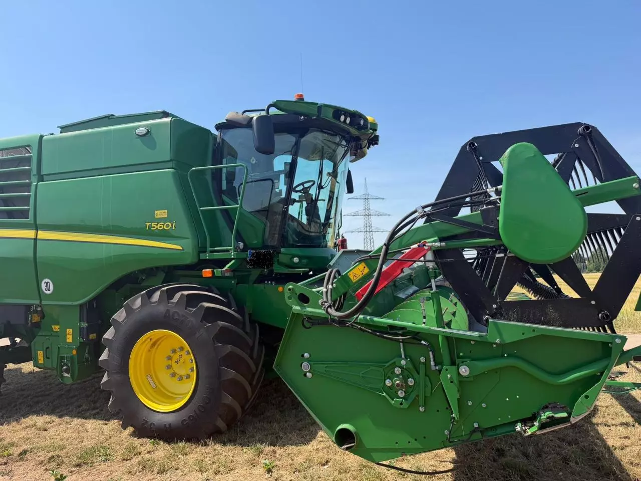 John Deere T560 Mähdrescher gebraucht Ansicht 2